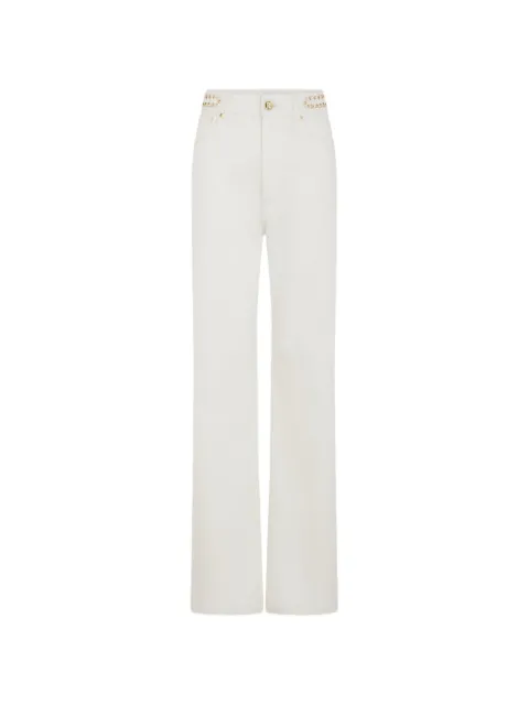 Rabanne jeans acampanados con lentejuela