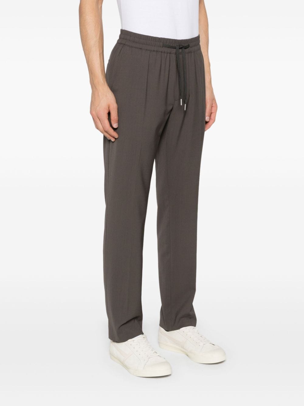 Shop Sandro Pressed-crease Trousers In Brown