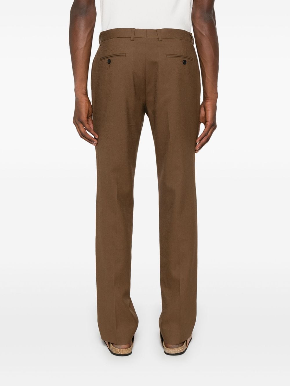 Shop Sandro Pressed-crease Knitted Trousers In Brown