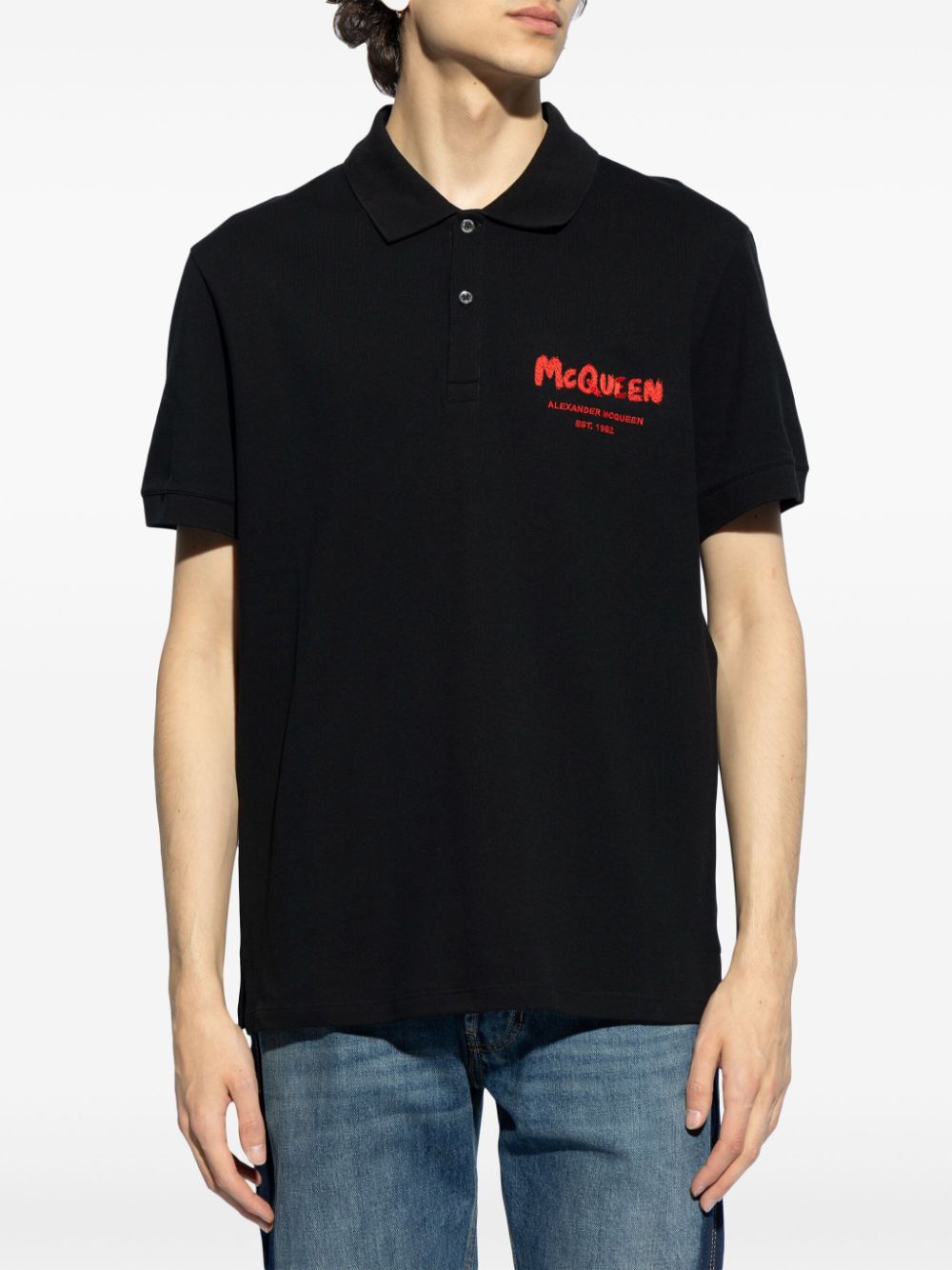 Shop Alexander Mcqueen Logo-print Polo Shirt In Schwarz