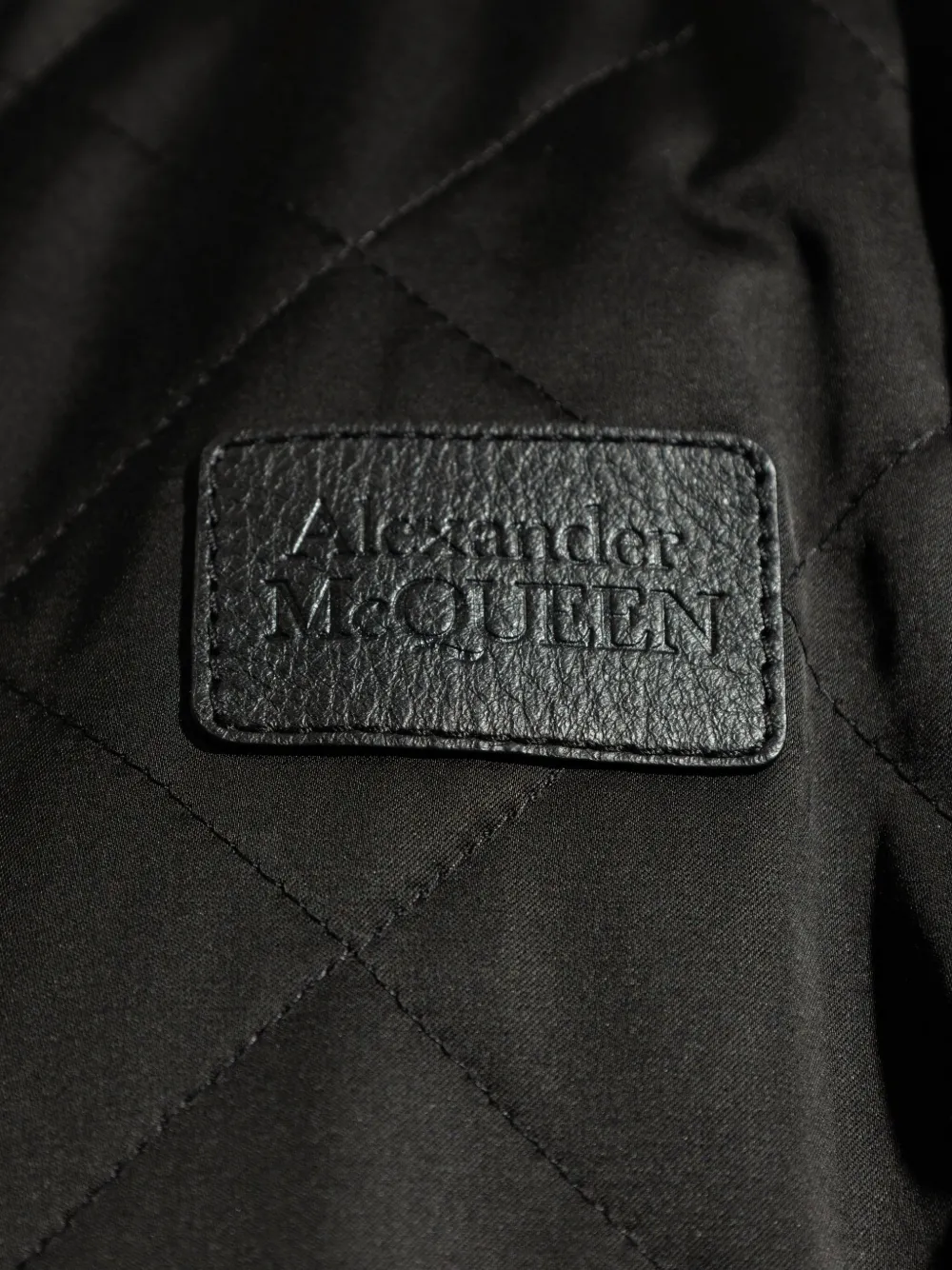 Shop Alexander Mcqueen Diamond-quilting Bomber Jacket In Black