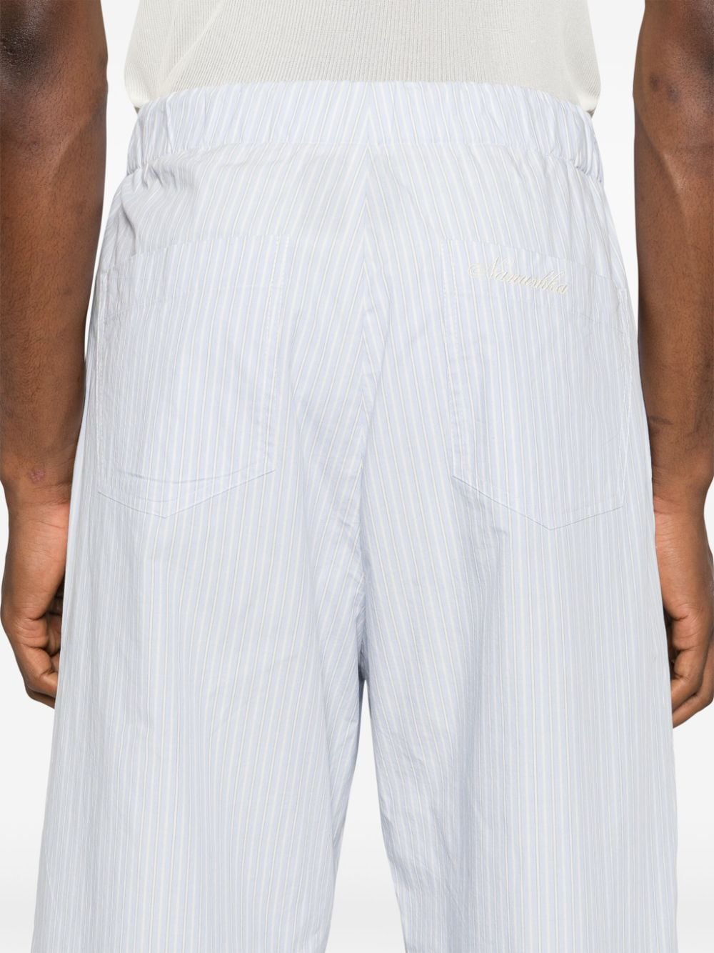 Shop Nanushka Arnaud Pinstriped Trousers In Blue