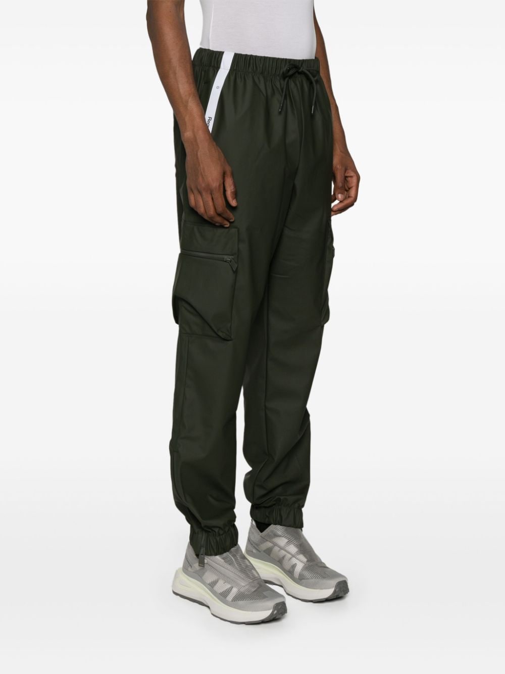 Shop Rains Waterproof Cargo Track Pants In Green