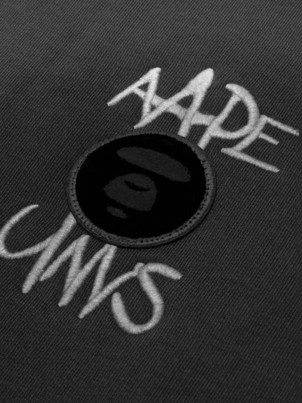 APE ポロシャツ AAPE BY *A BATHING APE® ロゴ ポロシャツ | ブラック | FARFETCH JP