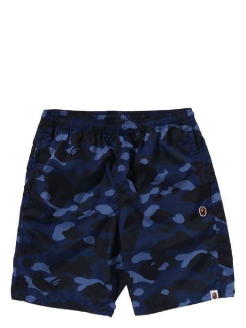 A BATHING APE® camouflage-pattern swim shorts