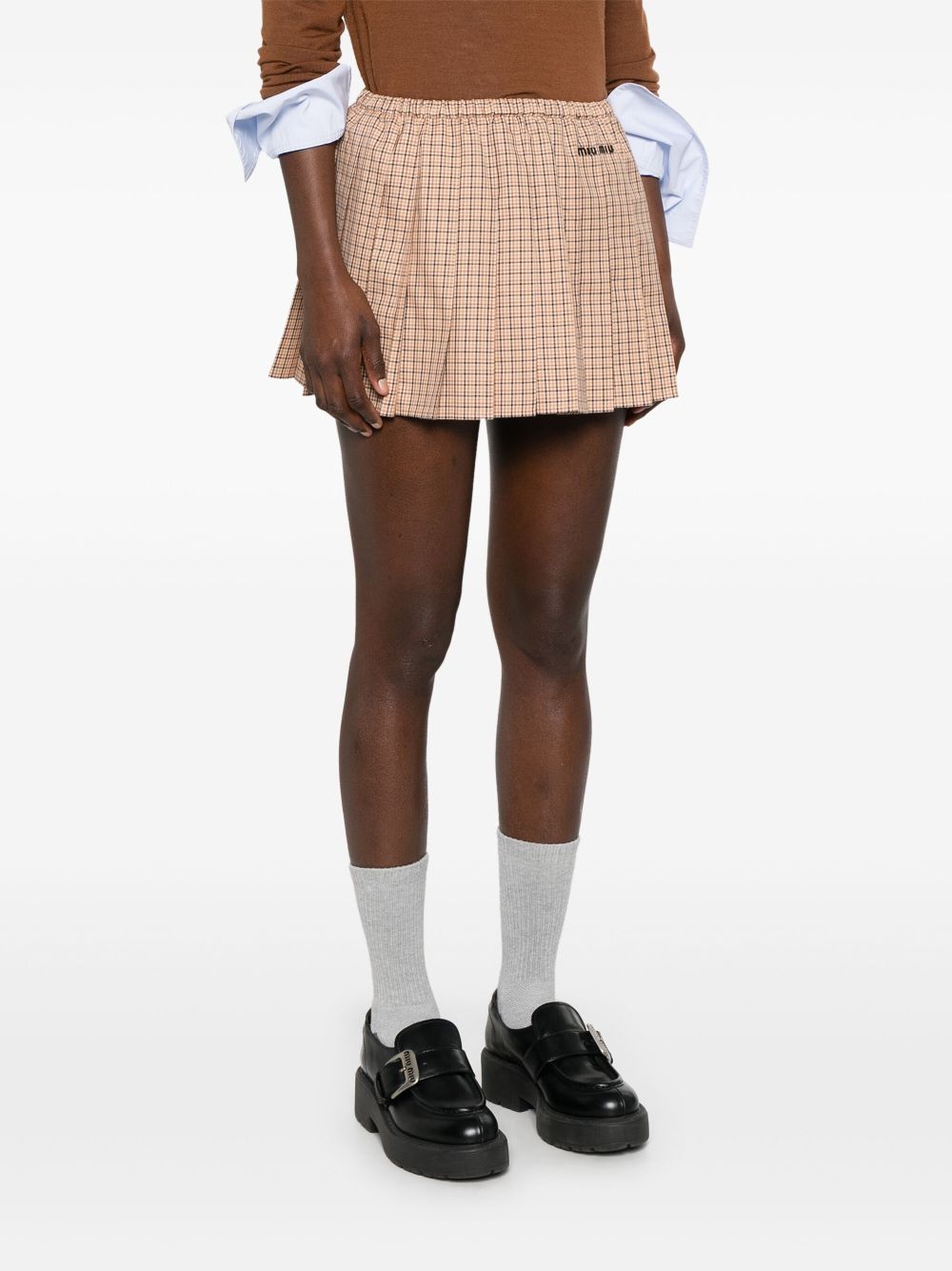 Rep Miu Miu logo-embroidered checked mini skirt Women