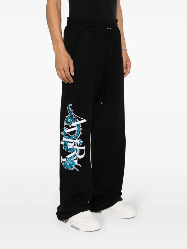 AMIRI CNY Dragon Cotton Track Pants | Black | FARFETCH