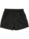 Walter Van Beirendonck Space logo-embossed track shorts - Black