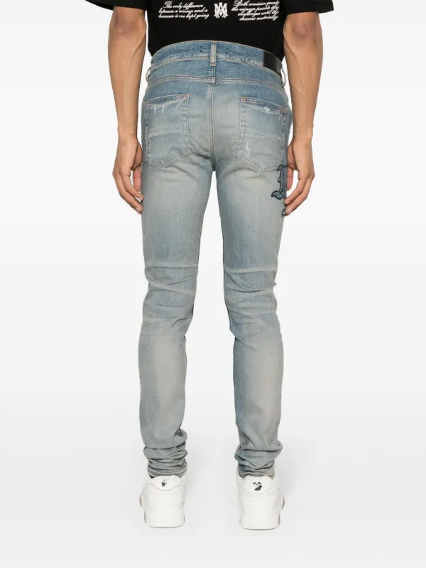 AMIRI Distressed Skinny Jeans | Blue | FARFETCH AMIRI Distressed Skinny Jeans | Blue | FARFETCH