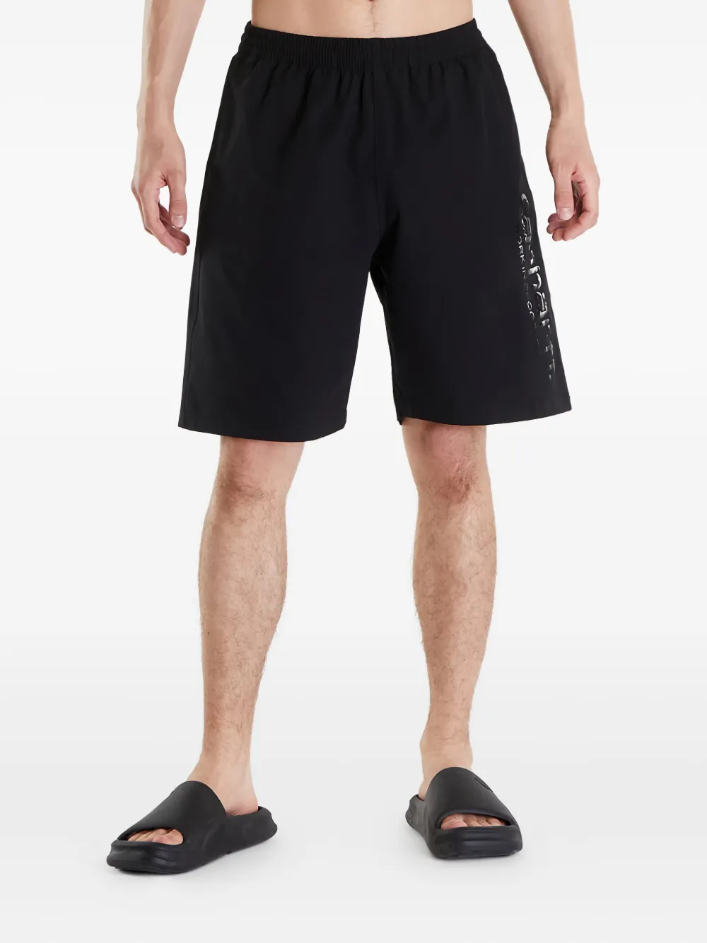 Carhartt WIP شورت سباحة بطبعة شعار الماركة | أسود | Image 1