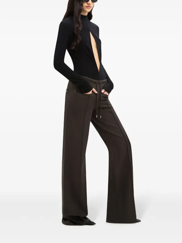 Courrèges Tracksuit Interlock low-rise Baggy Pants | Black | FARFETCH