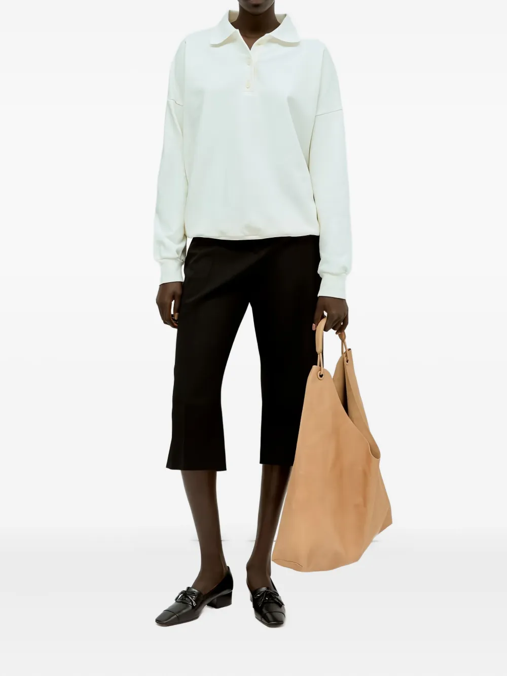 The Row flared crop trousers - Zwart