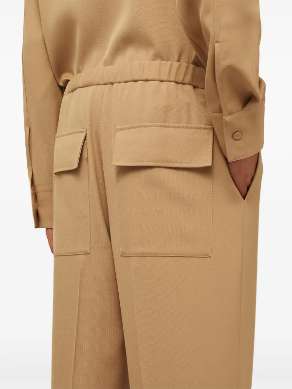 Jil Sander elasticated-waist Tapered Trousers | Brown | FARFETCH