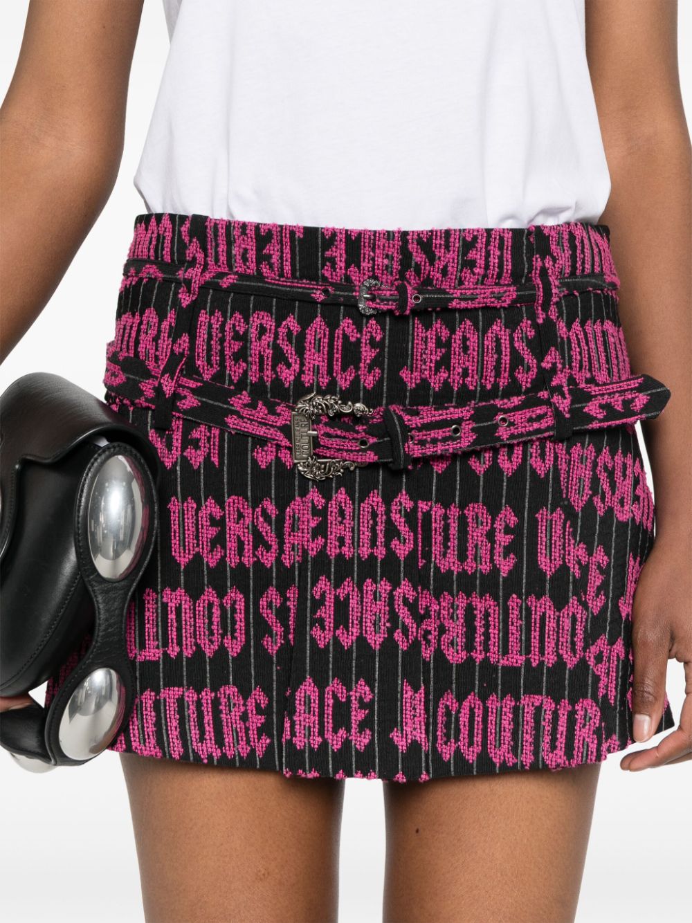 Shop Versace Jeans Couture Embroidered-logo Pleated Mini Skirt In Black