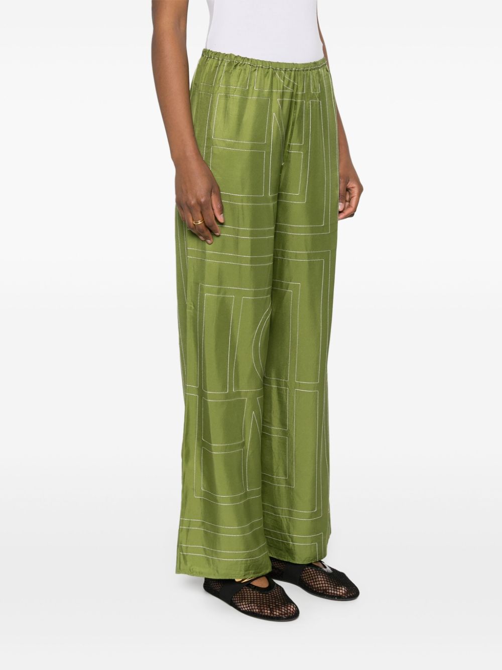 Shop Totême Monogram Silk Straight-leg Trousers In Green