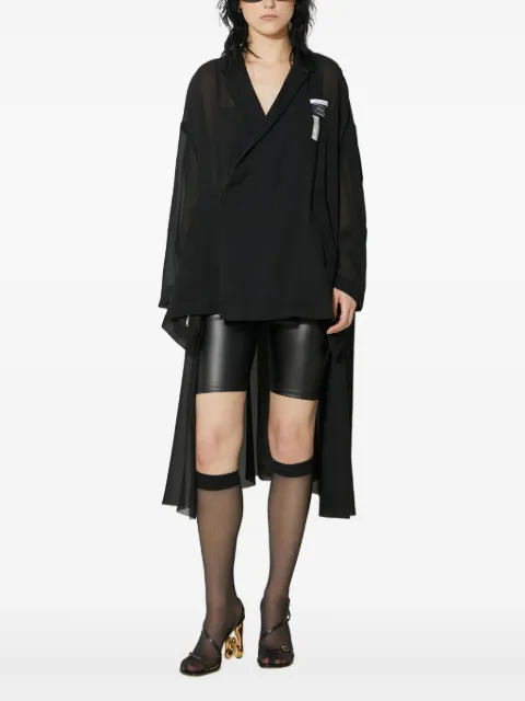 Undercover asymmetrical top