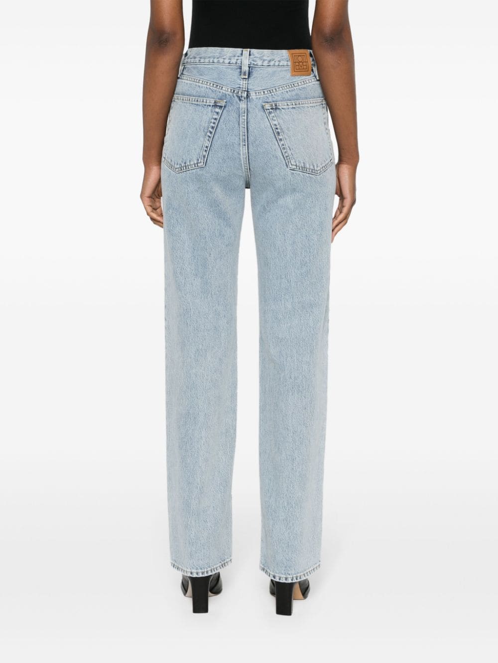 Shop Totême Logo-patch Cotton Jeans In Blue