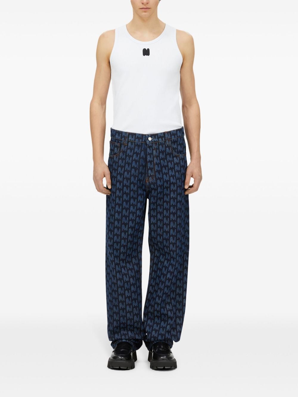 Shop Msgm Monogram-print Cotton Jeans In Blue