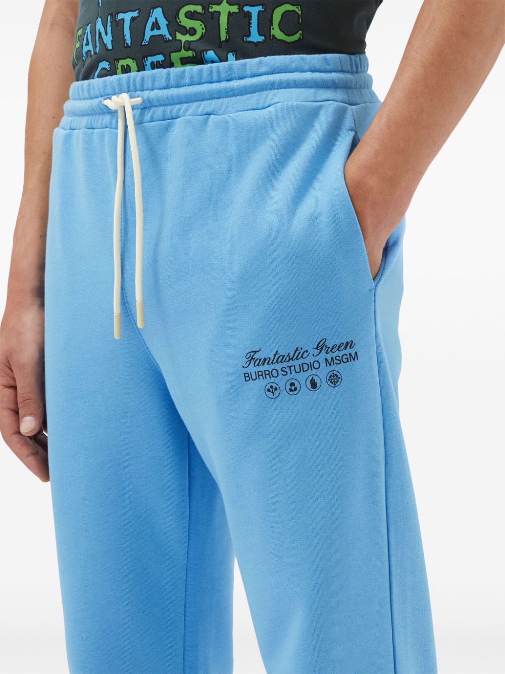 Shop Msgm Logo-print Organic Cotton Track Pants In Blue