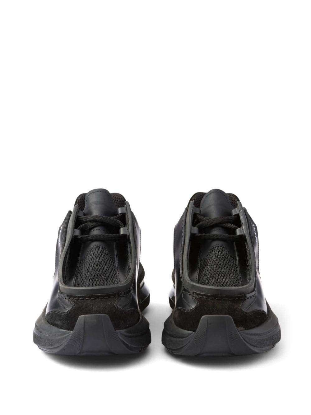 Shop Prada Logo Print Panelled Sneakers In Black