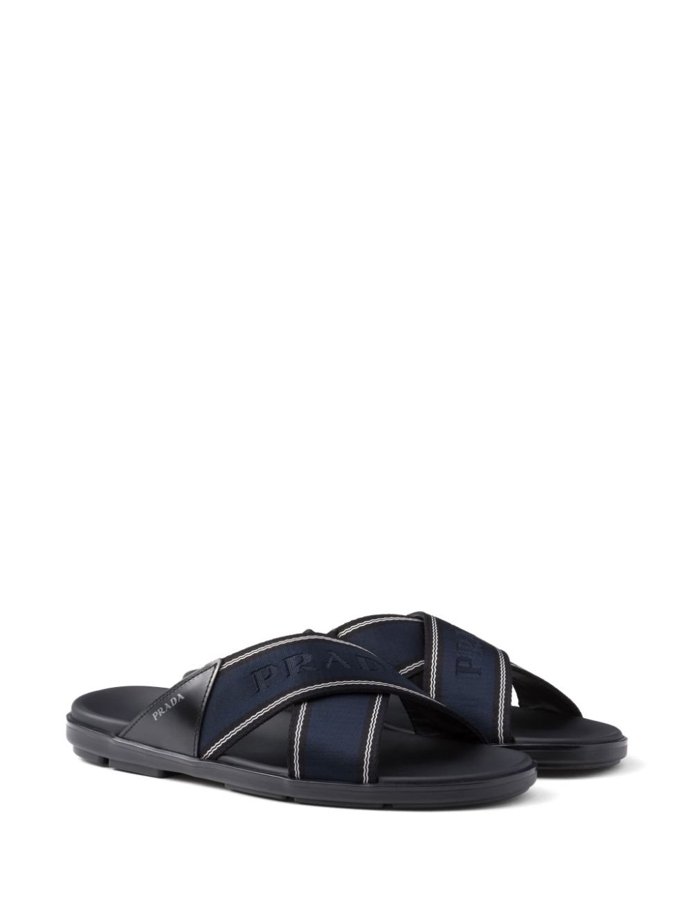 Prada logo-jacquard crossover slides - Blauw