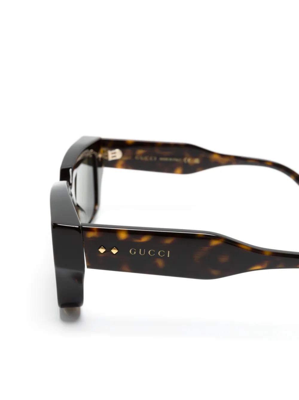 Gucci Eyewear Zonnebril met rechthoekig montuur en schildpadschild design Bruin
