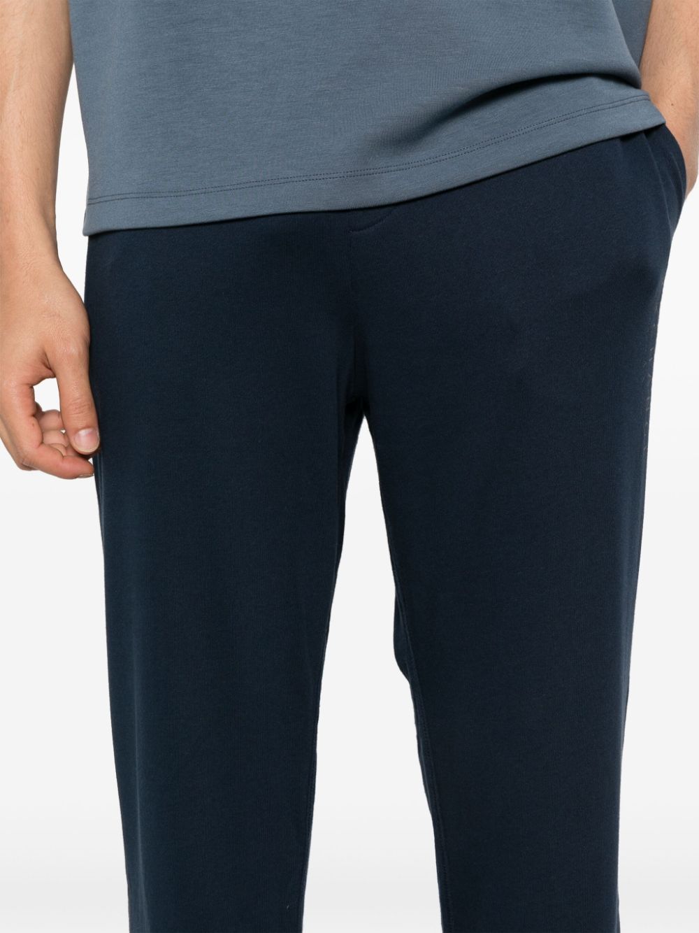 Armani Exchange logo-print tapered trousers Men