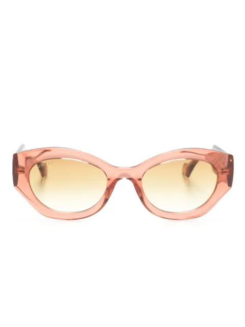 Gucci Eyewear lentes de sol con armazón ovalada y motivo Interlocking G