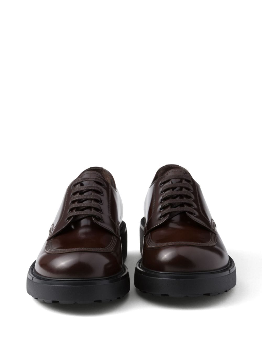 Shop Prada Brushed Leather Derby Shoes In Braun