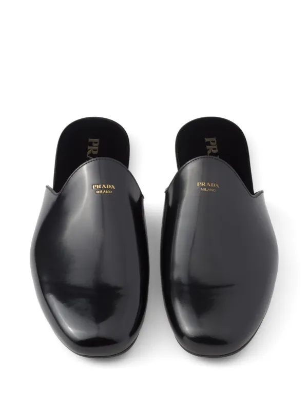 サンダル・ミュール Prada Black Leather Slippers Prada logo-embossed Brushed Leather Slippers | Black | FARFETCH