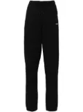 Coperni logo-print track pants - Black
