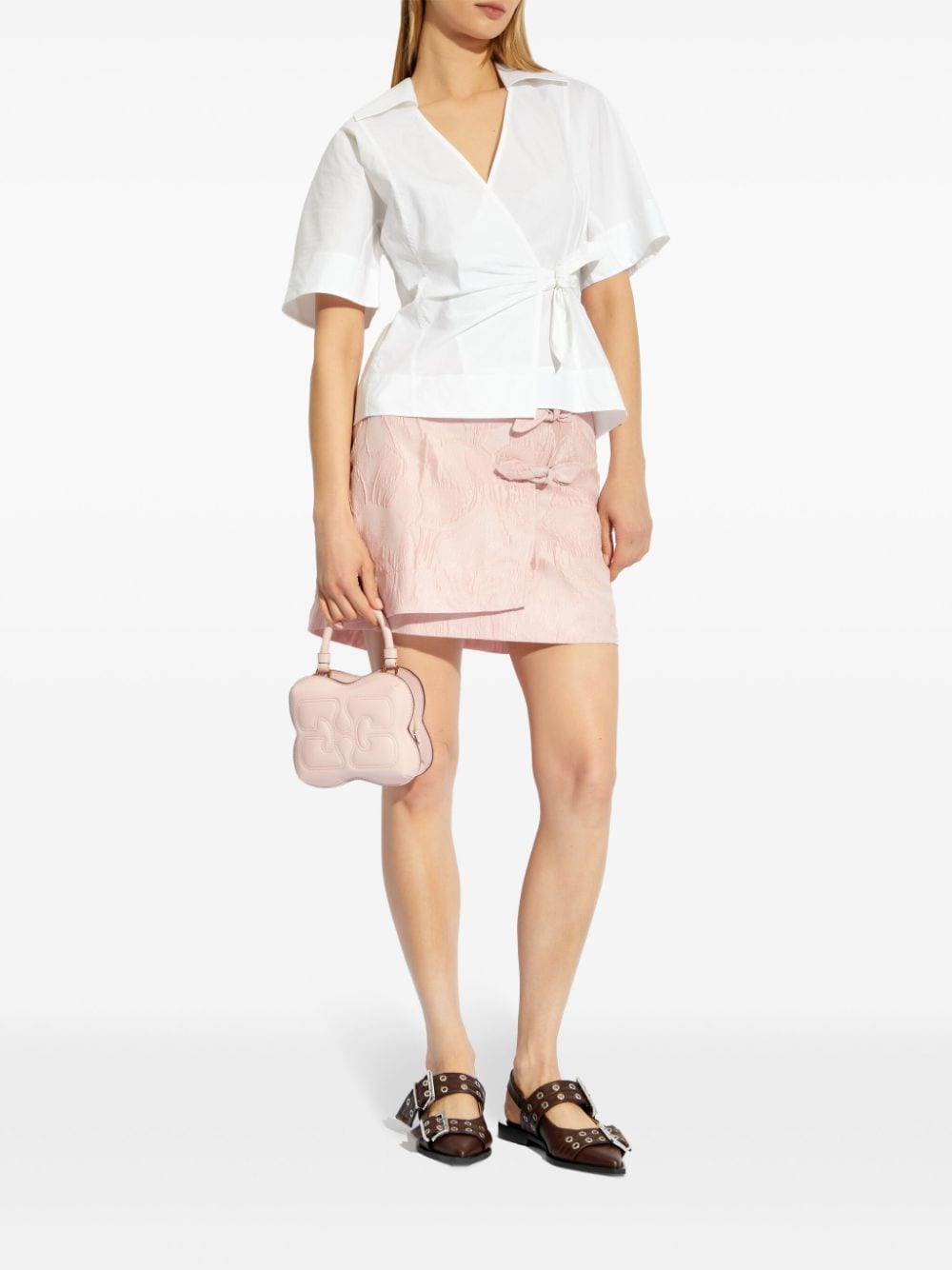 GANNI bow-detailing cloqué skort - Roze