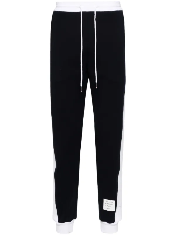 Thom Browne ミッドライズ トラックパンツ | ブルー | FARFETCH JP