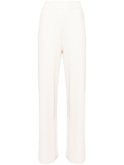 Aje logo-tape ribbed-knit trousers