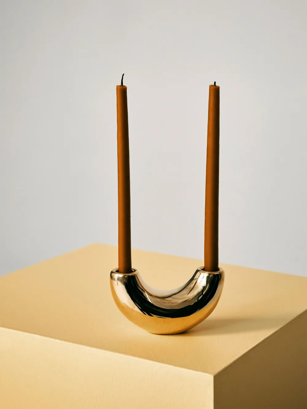 DINOSAUR DESIGNS HORN BRASS CANDLE HOLDER