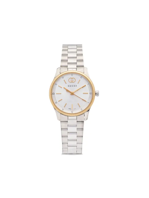 Gucci women's gold and silver watch hotsell