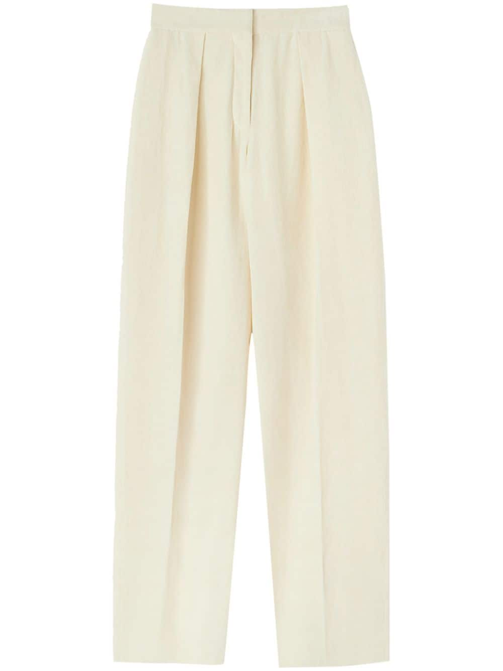 Jil Sander High waist broek met toelopende pijpen Beige