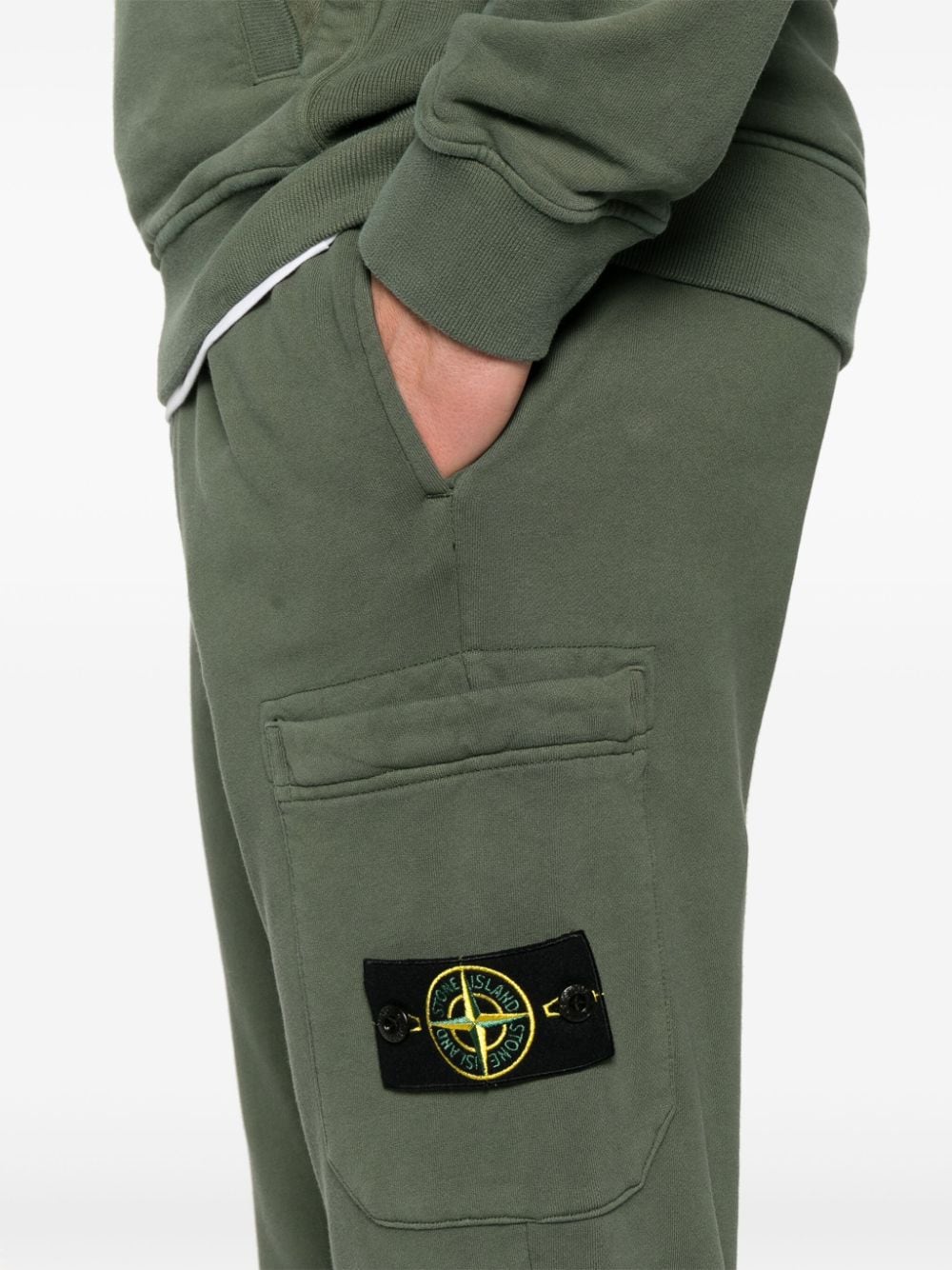 Shop Stone Island Compass-badge Tapered Trousers In Green