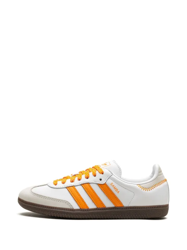 Adidas shoes with orange stripes online