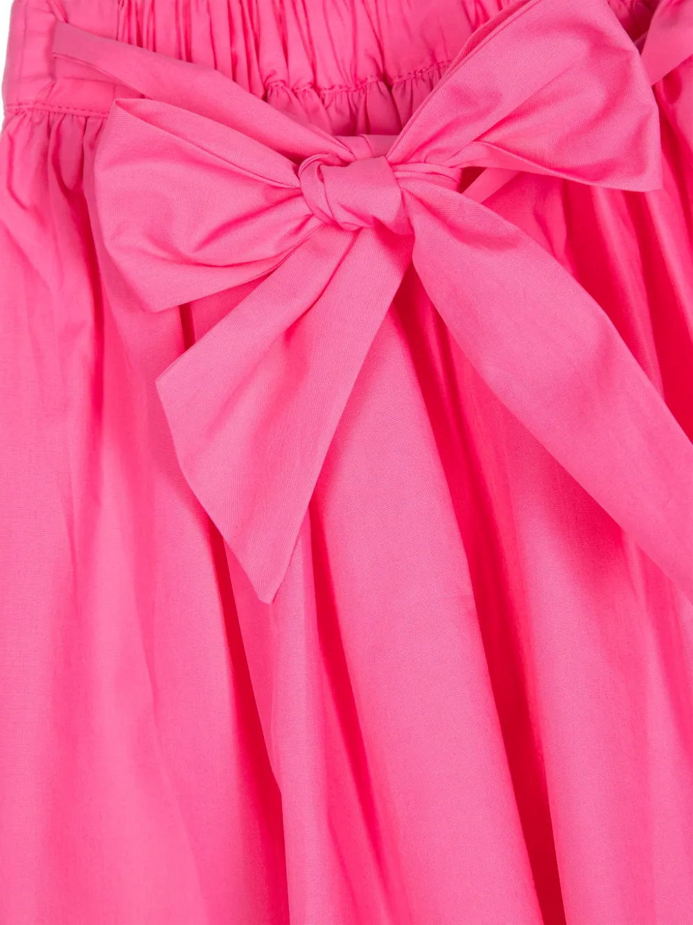 KINDRED BOW-DETAIL PLEATED SKIRT