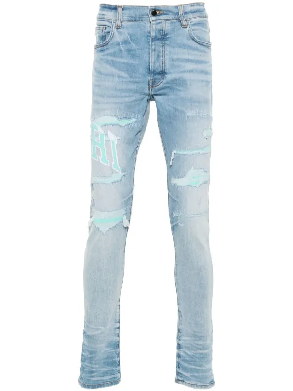 AMIRI Varsity Logo Skinny Jeans | Blue | FARFETCH GE