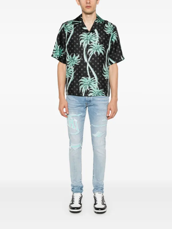 AMIRI Varsity Logo Skinny Jeans | Blue | FARFETCH AMIRI Varsity Logo Skinny Jeans | Blue | FARFETCH