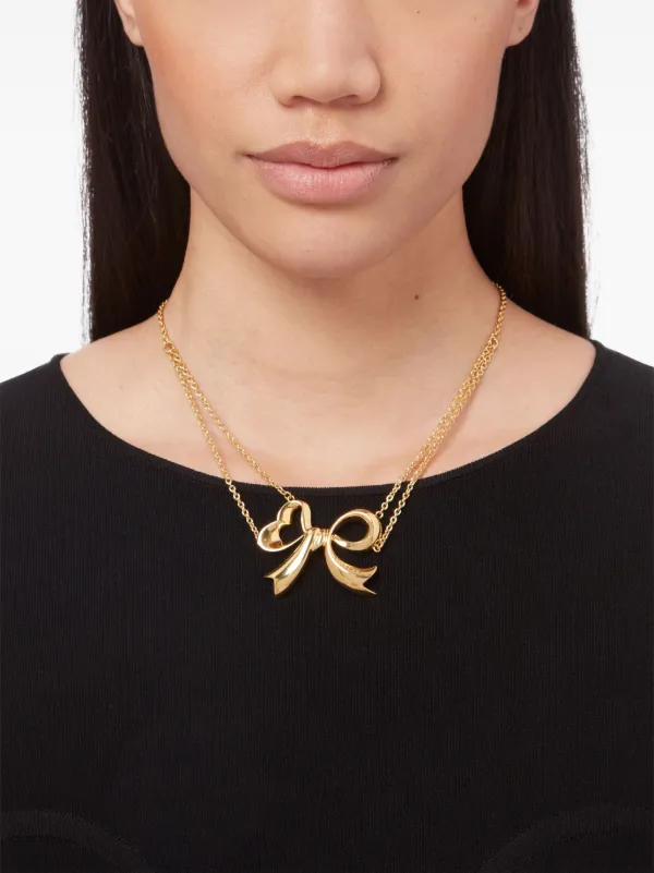 Nina ricci gold necklace discount