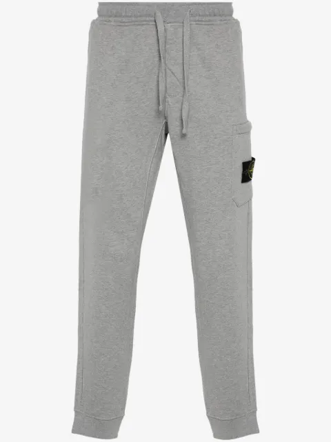 Stone Island Pantaloni affusolati mélange con applicazione Compass