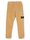 Stone Island Junior Compass-badge corduroy tapered trousers - Yellow