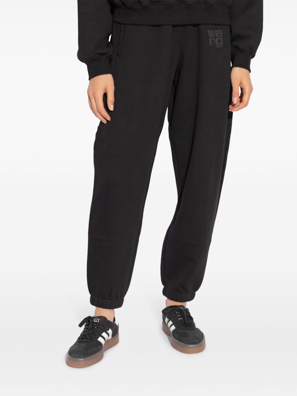 Shop Alexander Wang Puff-logo Cotton Track Pants In 黑色