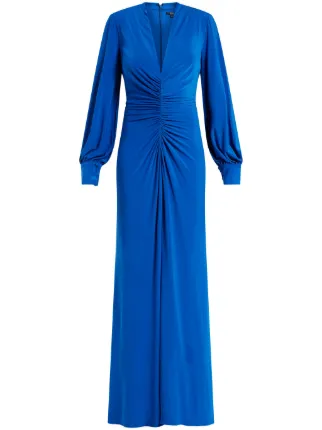 badgley mischka blue dress Cobalt Ruffle Sleeved Gown Elilhaam Draped One Shoulder Cape This tailored Drape shoulder cape radiates classic sophistication with its deep burgundy shade and asymmetrical draped collar Badgley Mischka Strapless Bow Gown