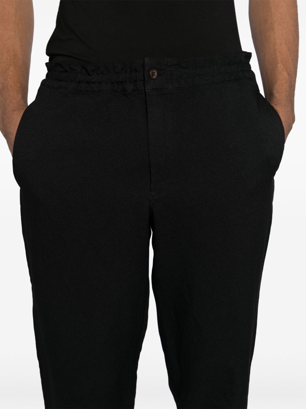 Black Comme Des Garcons elasticated waist cropped trousers Men