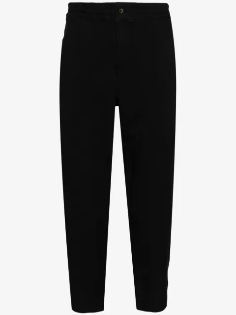 Black Comme Des Garçons elasticated waist cropped trousers