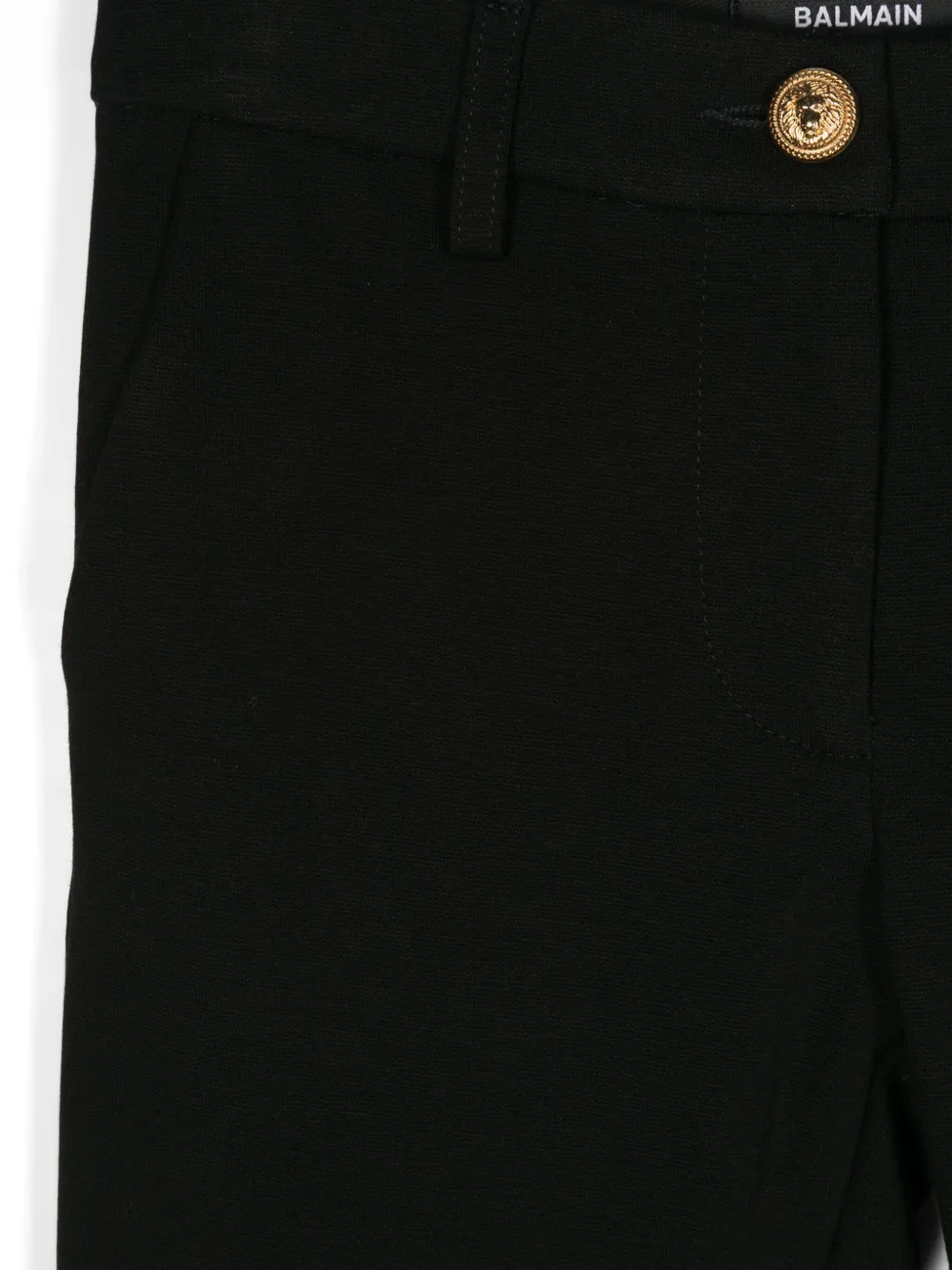 BALMAIN MID-RISE FLARED TROUSERS